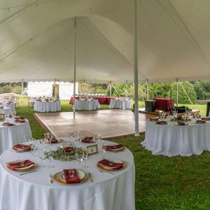 table settings in tented wedding event