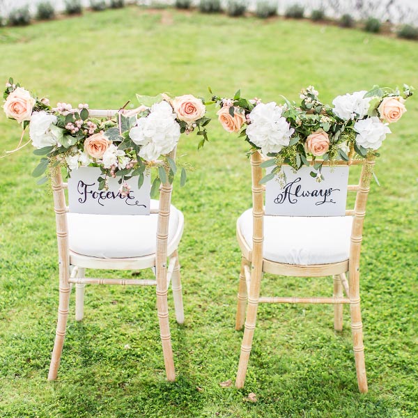 chairs decorated with flowers